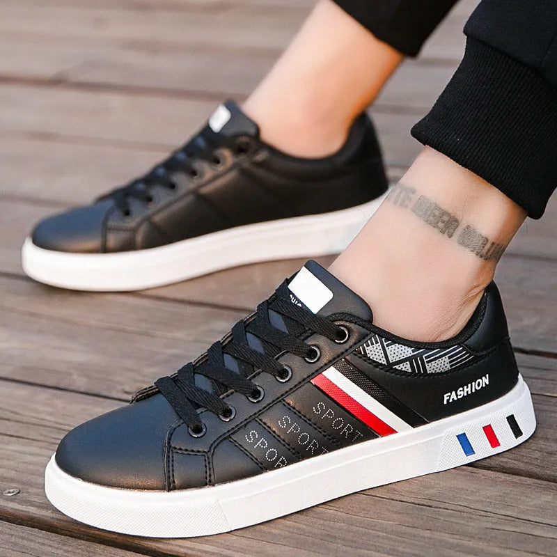 Black, grey, and white sports shoes on a size chart showing EU sizes 39 to 44 with foot length measurements.
