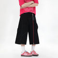 Retro denim workwear shorts with wide leg cut and multiple pockets in red colour