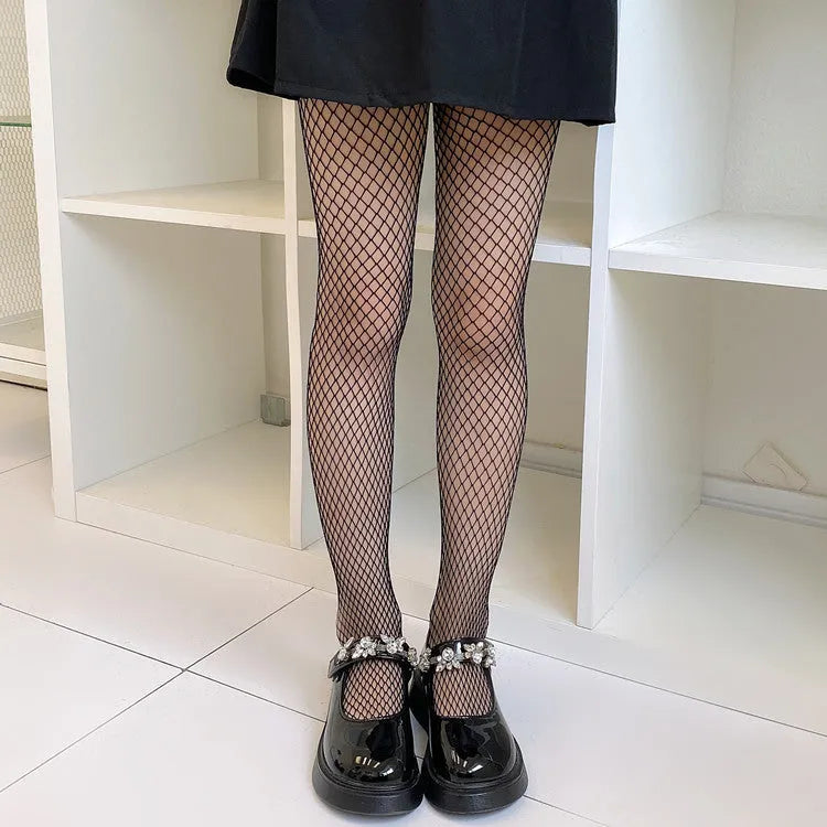 Women's summer mesh stockings in black and white, showing large, medium, and small net patterns.