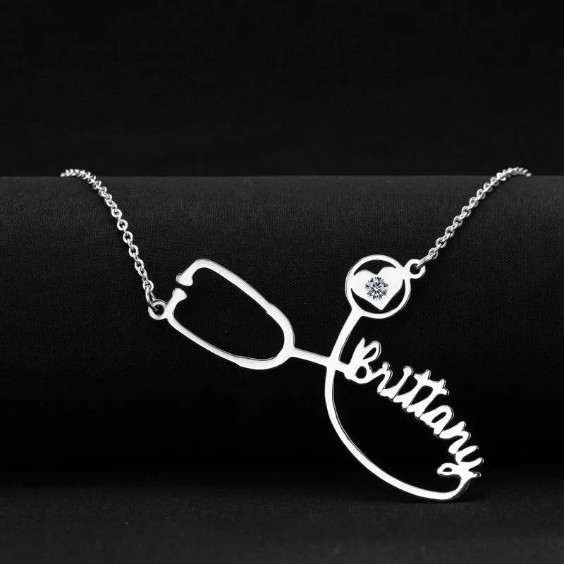 Customised titanium steel stethoscope name necklace for women in gold finish with blade chain