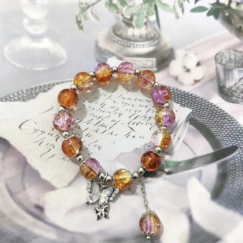 Handmade Chinese style glass bracelet with bamboo joint beads in a red Lvzhu Duobao design.