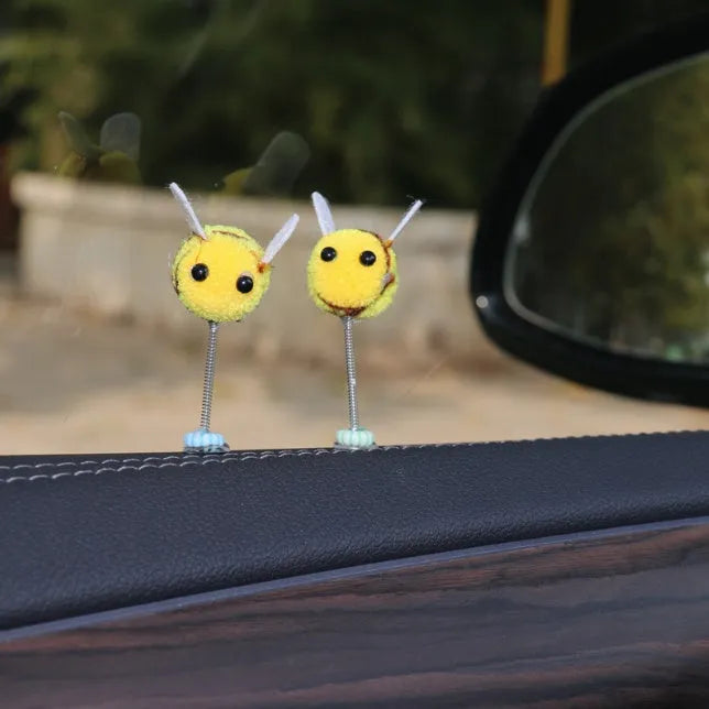 Swing Spring Bee car dashboard decoration showing cartoon bee design on fur ball material