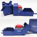 Plastic eternal flower in a cardboard jewellery gift box