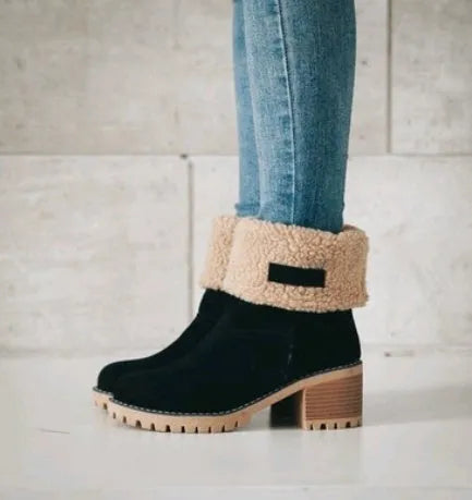 Women's mid-calf suede snow boots with a thick low heel and round toe in grey.