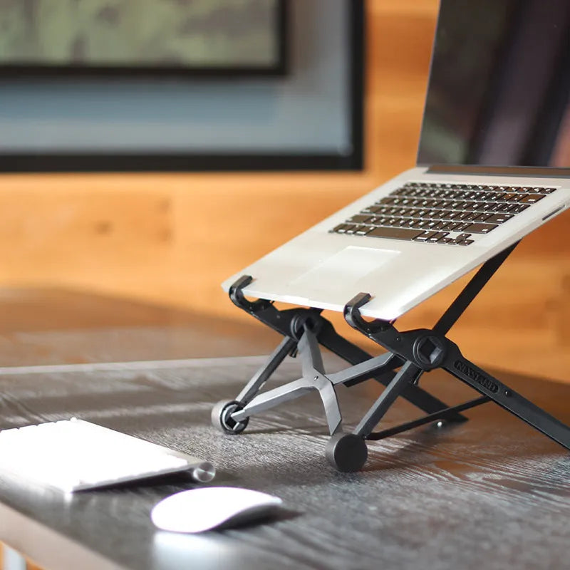 Black folding laptop stand with reinforced nylon construction shown in open and closed positions