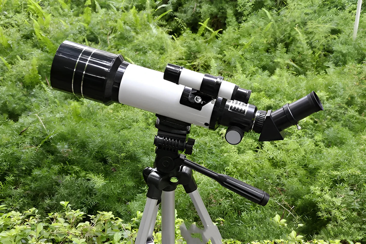 Children's dark blue astronomical telescope with tripod for sky observation