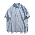 Blue striped overalls shirt with short sleeves and loose cardigan style