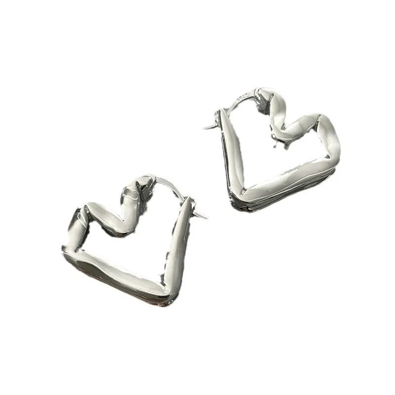 Unisex heart shaped ear clip earrings in gold and silver, retro minority design