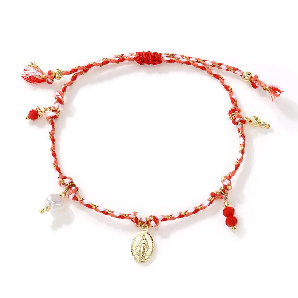 A colourful hand-woven braided rope bracelet for women in an ethnic strap tag style.