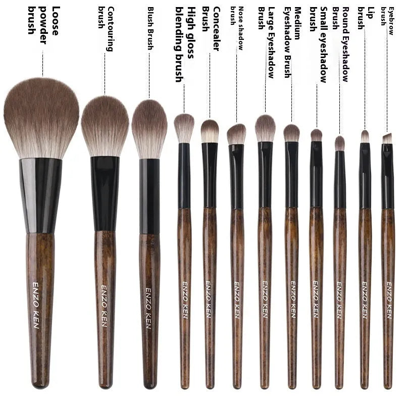 12-piece makeup brush set with wooden handles and a black PU storage pouch laid out.