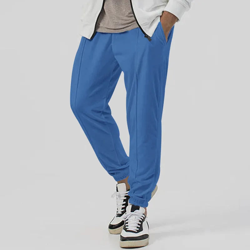 Men's gray elastic track sweatpants with straight-leg tapered design and mid waist