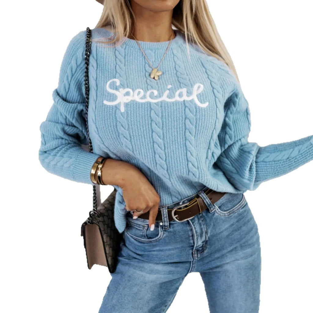 Blue crew neck pullover sweater with embroidered text letters on the front.