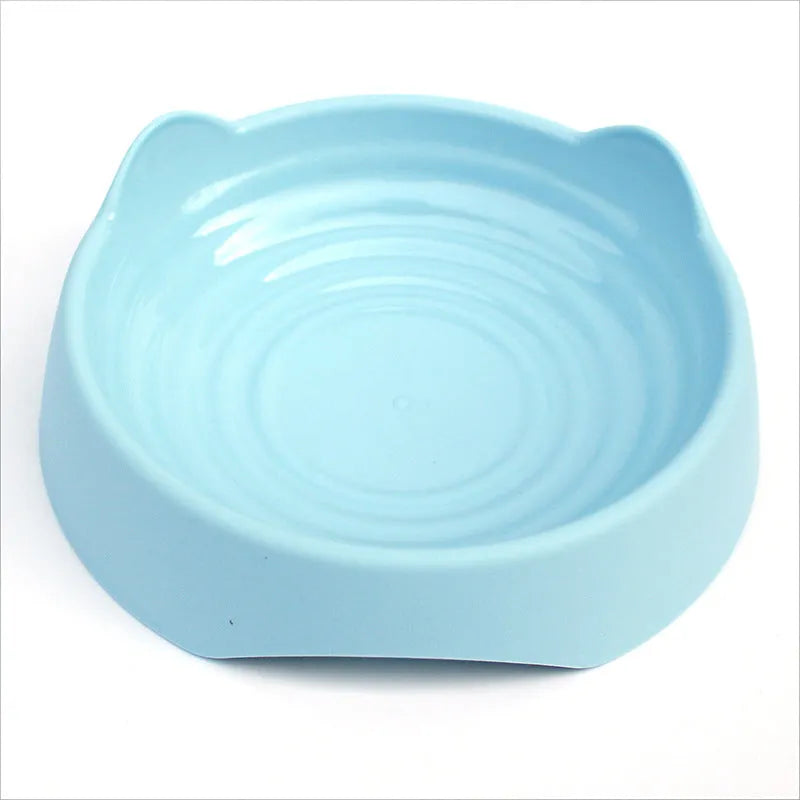 Ceramic dog slow feeder bowl with puzzle maze design in blue, green, or pink