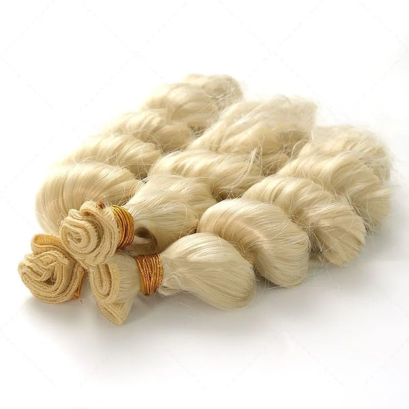 Golden synthetic hair weft wig showing length options on a stand.