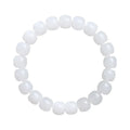 White Hetian jade barrel bead bracelet laid flat, showing unisex casual design.