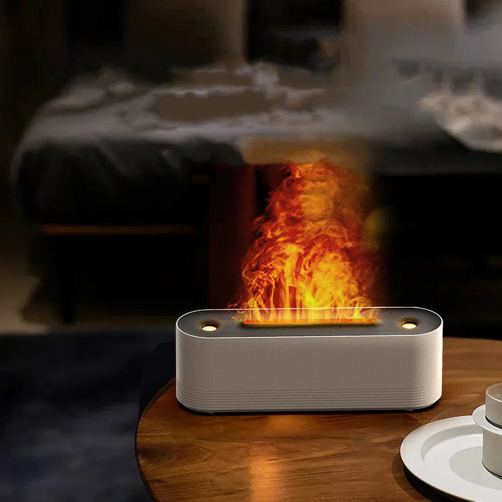 Black Flame Air ultrasonic humidifier diffuser with LED lights on a wooden table.