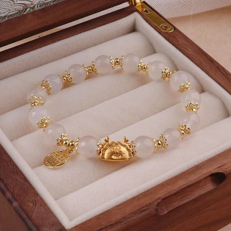 Women's floral glazed glass bracelet with electroplated zodiac charm and coloured beads
