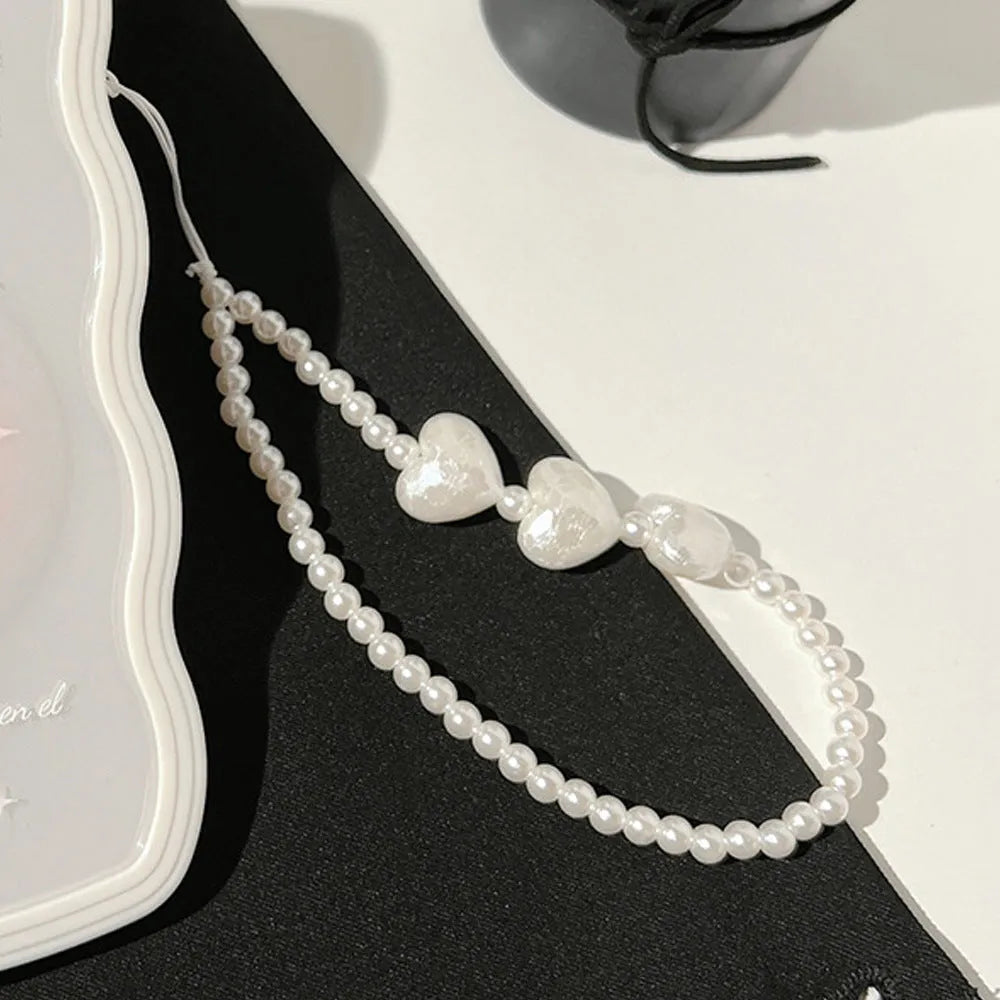 Transparent iPhone case with three-dimensional bow design and optional white love lanyard