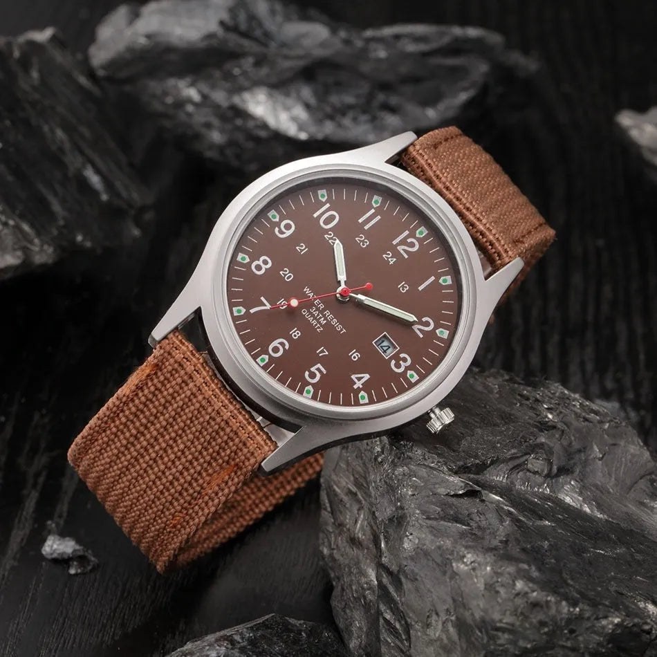 Men's military-style fabric band watch with calendar display and black face