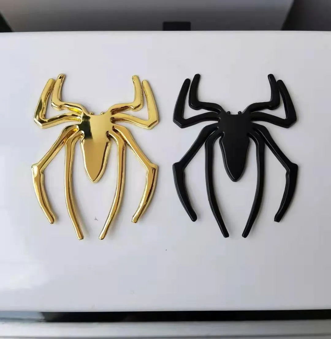 Three-dimensional metal spider bumper sticker in zinc alloy, showing detailed design
