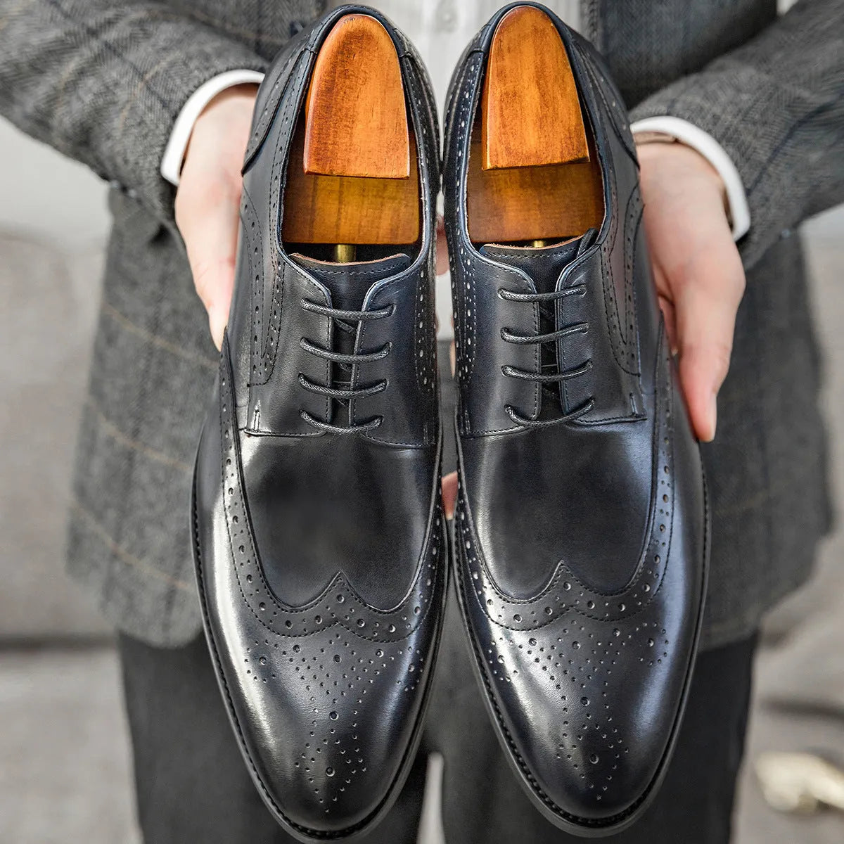 Men's burgundy British Brock pointed toe formal leather shoes on a white background.