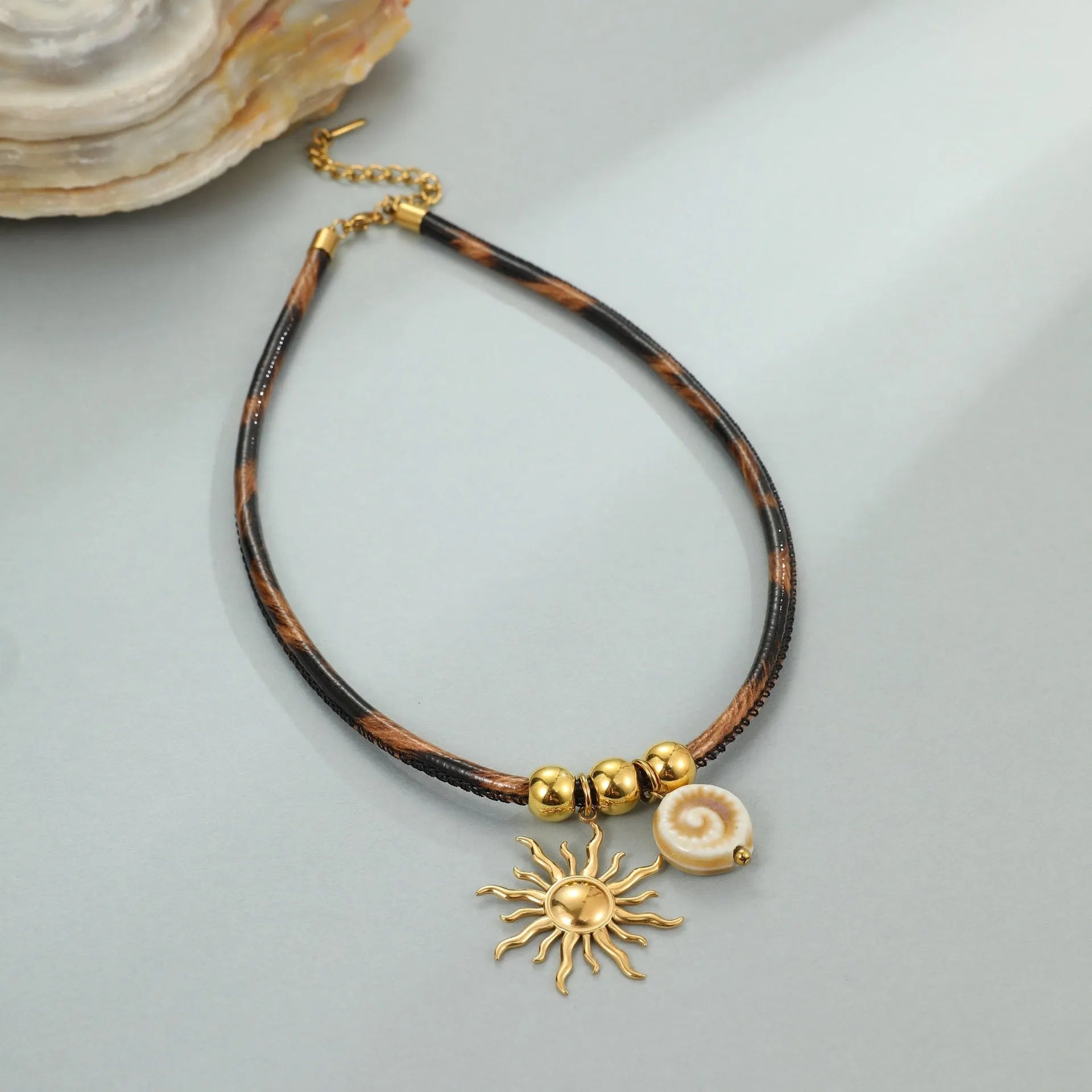 Women's geometric leopard pattern stainless steel necklace with gold electroplated finish on adjustable chain
