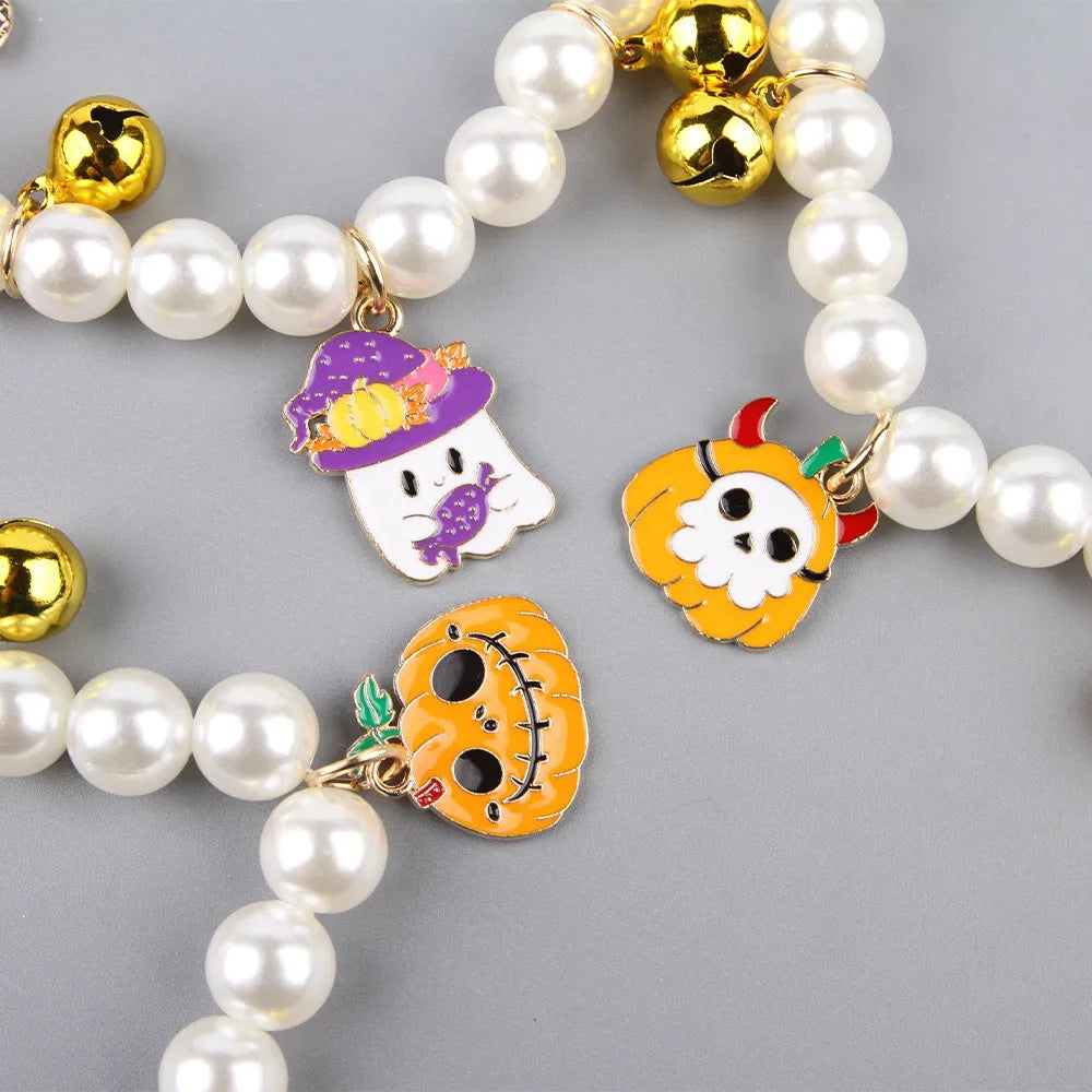 Halloween cat collar with simulated pearl necklace decoration showing pumpkin print patterns