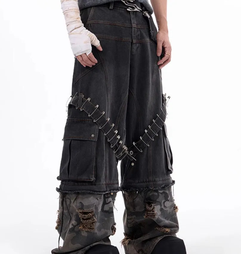 Men's grey and camouflage cotton jeans with splicing panel design and pin ribbon details.