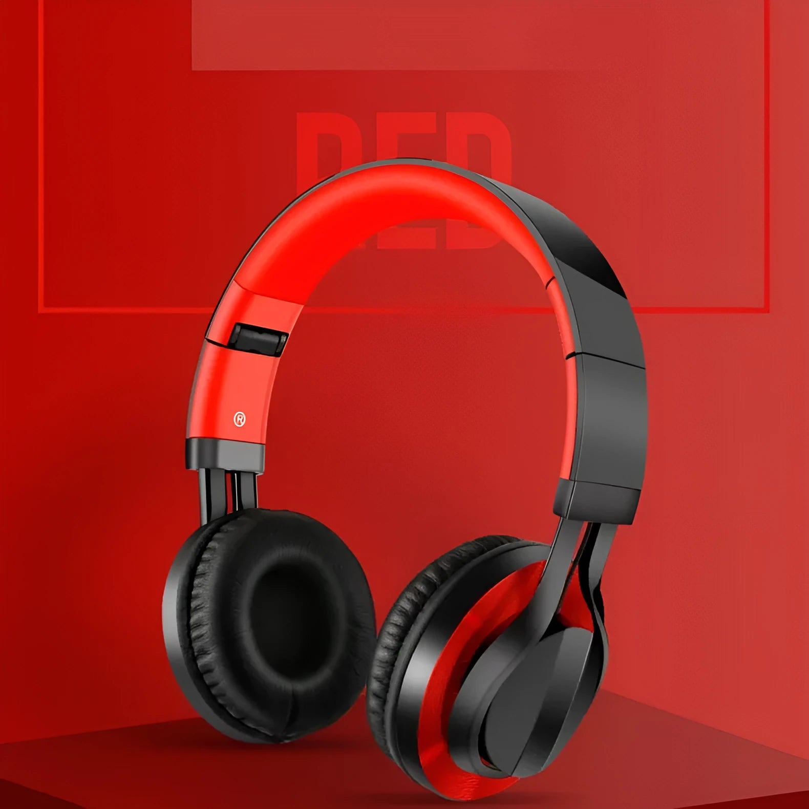 Black wired headphones with microphone showing 3.5mm plug and 40mm ear cups