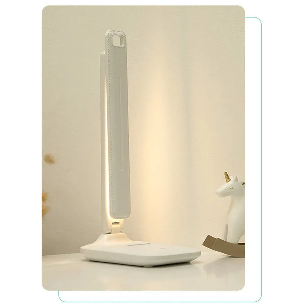 White plastic bedside lamp with touch dimming controls for children's bedroom eye protection lighting