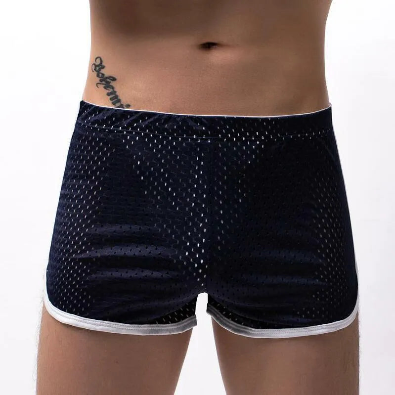 Men's black three-point boxer shorts made from a cotton and nylon blend fabric.