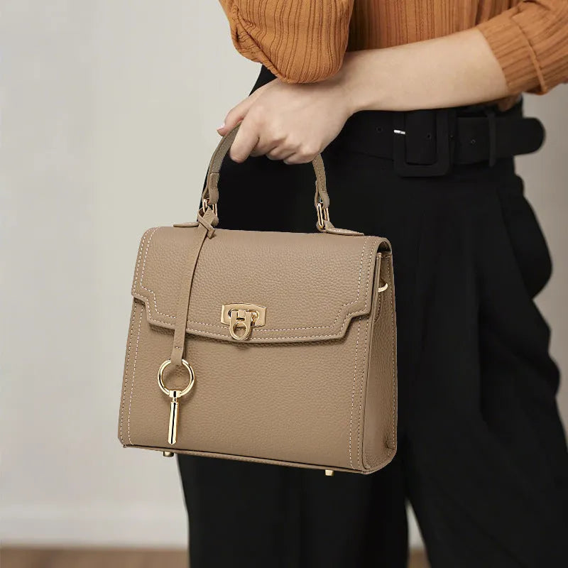 Elephant grey genuine leather vintage handbag with litchi pattern and lock closure