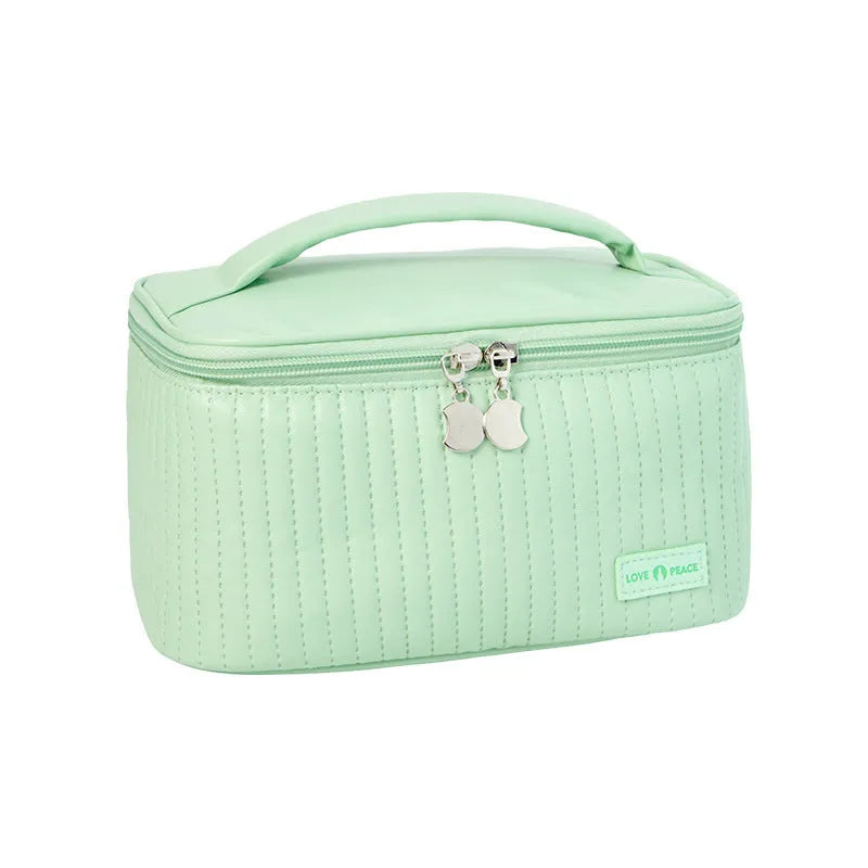 Open-top PU leather makeup bag in a pastel colour from a range of six options.
