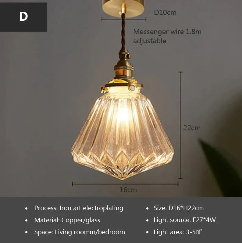 Brass chandelier with glass ball shades measuring 17.5cm wide, showing electroplated copper construction
