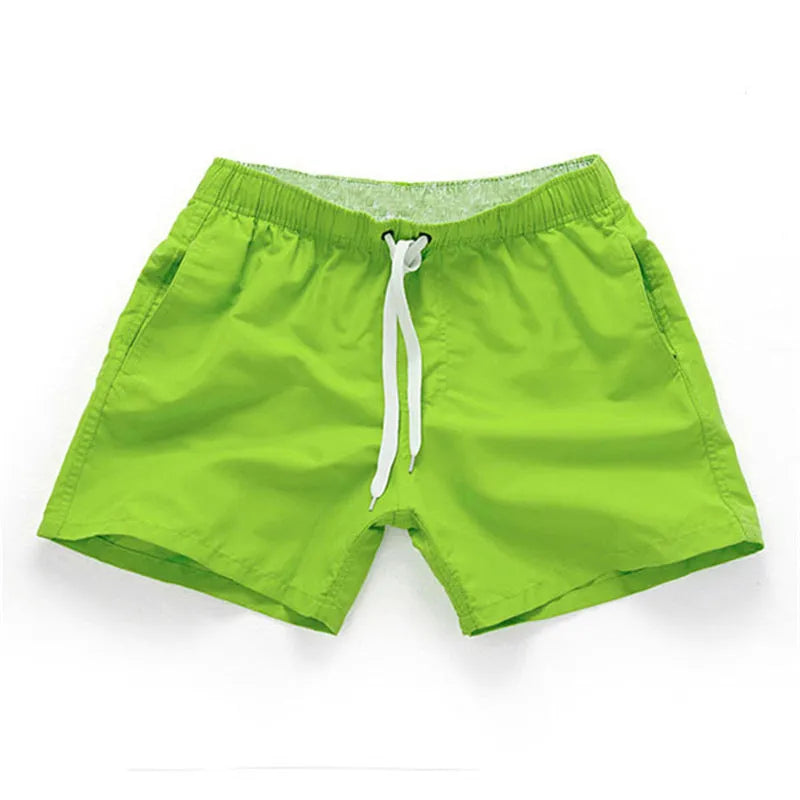 Men's polyester beach shorts in multiple colours with straight leg design for surfing and casual wear