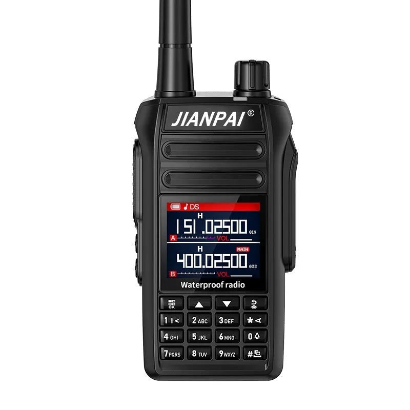 Black Interphone aviation communication headset with microphone, battery, antenna, and charging accessories on a flat surface.