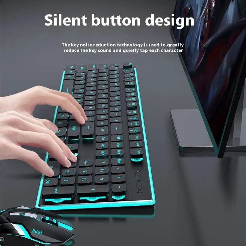 Wireless mute Bluetooth keyboard with ice blue backlighting on desk