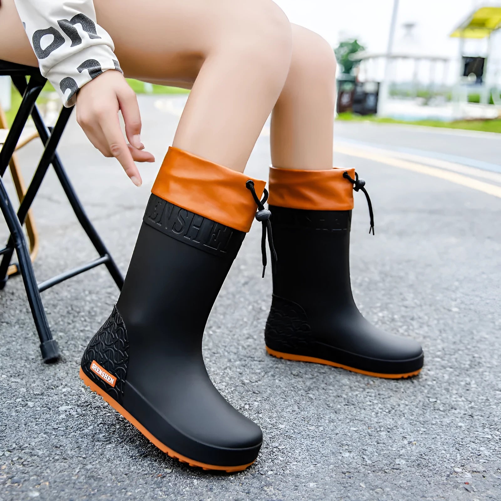 Women's PVC rain boots in apricot, black, brown and pink colours with non-slip wear-resistant construction