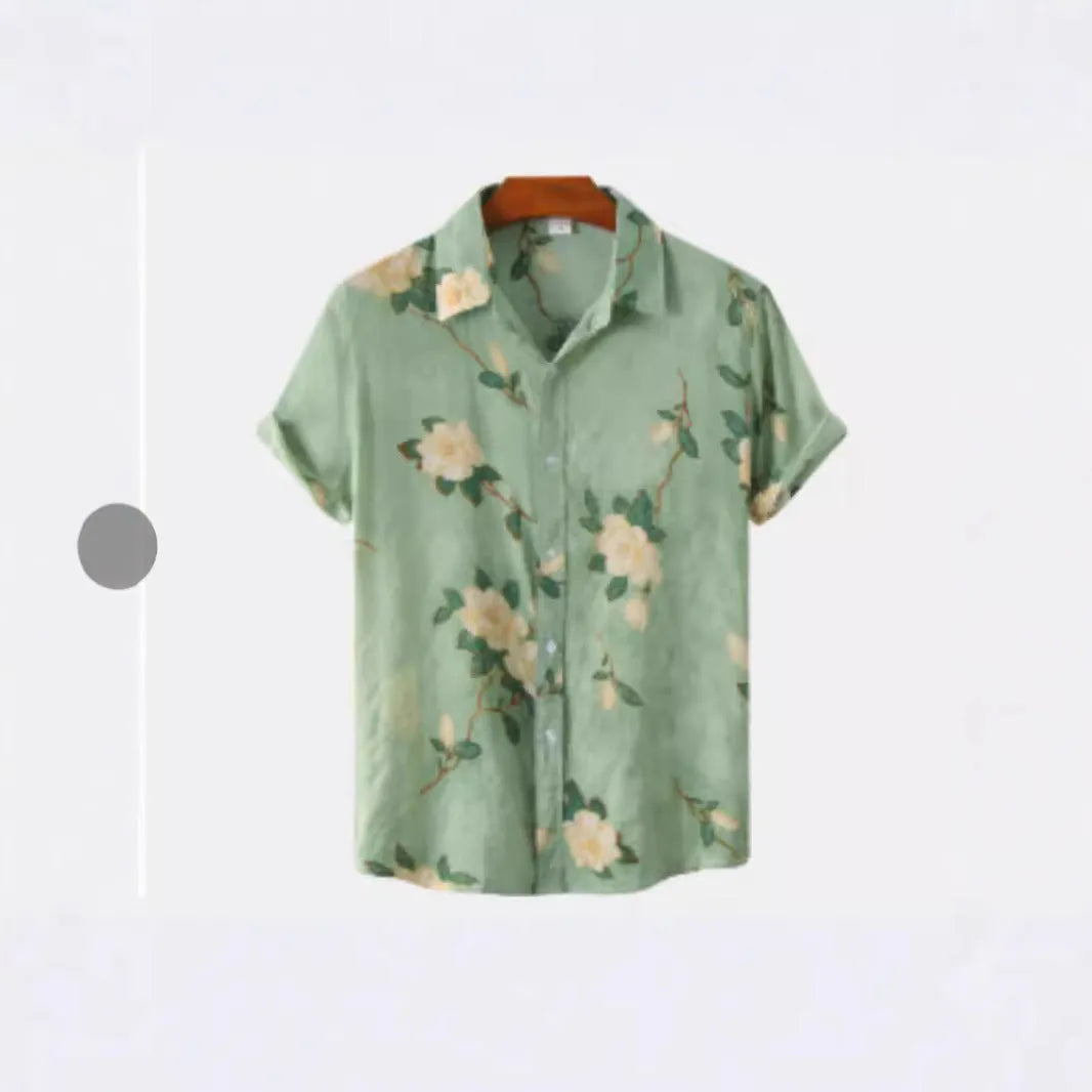 Man wearing a short sleeve lapel collar Hawaiian shirt with a blue floral print.