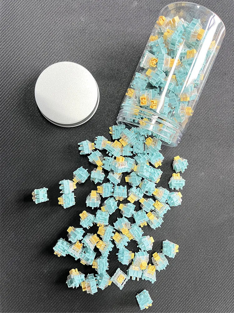 36 Tiger Mo Sea Salt Lemon PRO Mute linear silent mechanical keyboard switches arranged in a grid.