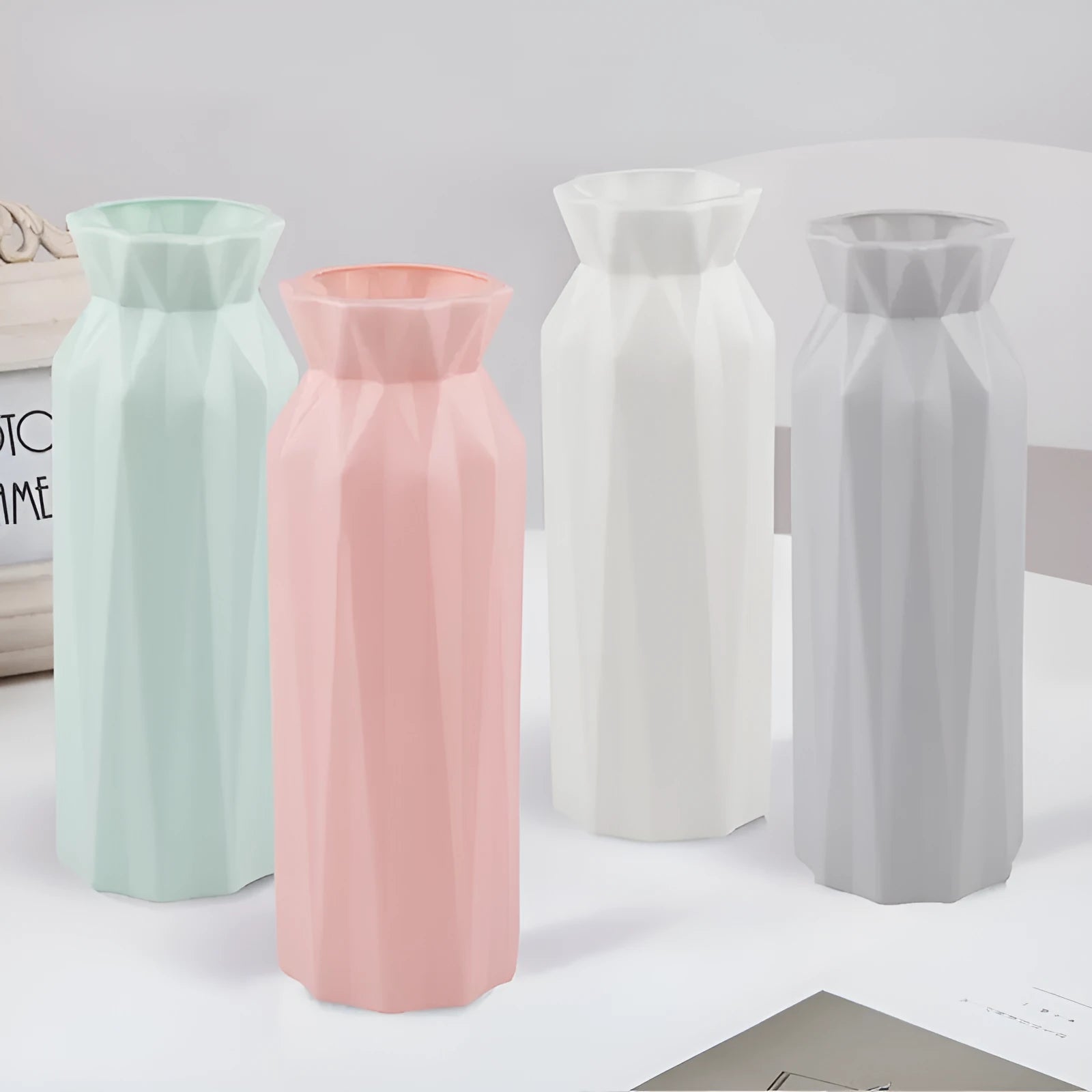 Green drop-resistant melamine vase with a 7.2cm base on a wooden table.
