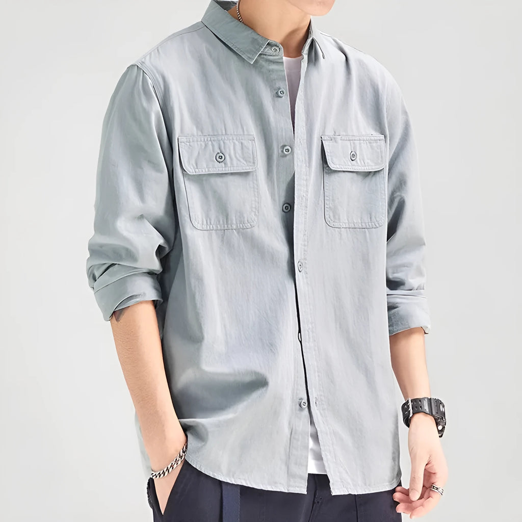 Man wearing loose fit long sleeve shirt overalls in cardigan style, made from polyester fabric