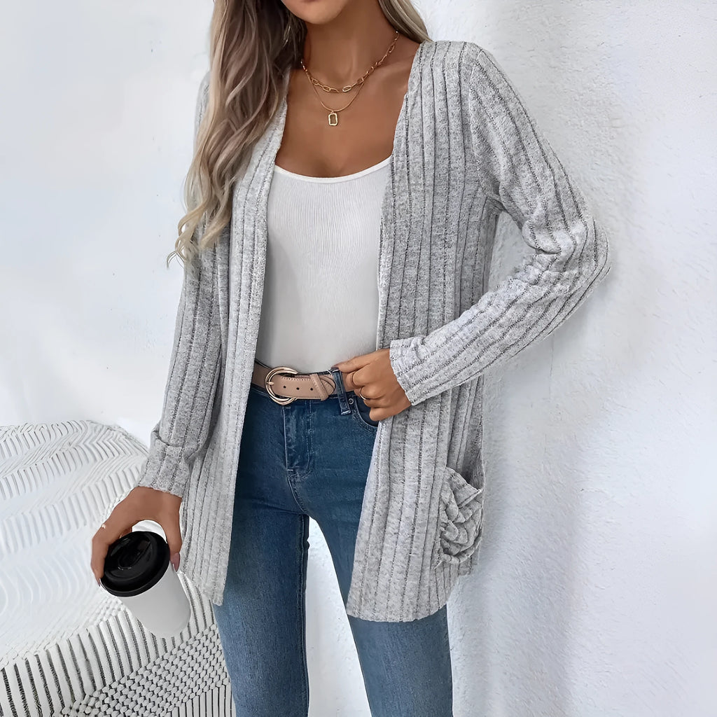 Long sleeve loose fit cardigan in solid colour with pockets, shown in black and granny grey.