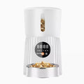 Black and white automatic pet feeder with mobile app remote control and USB power connection