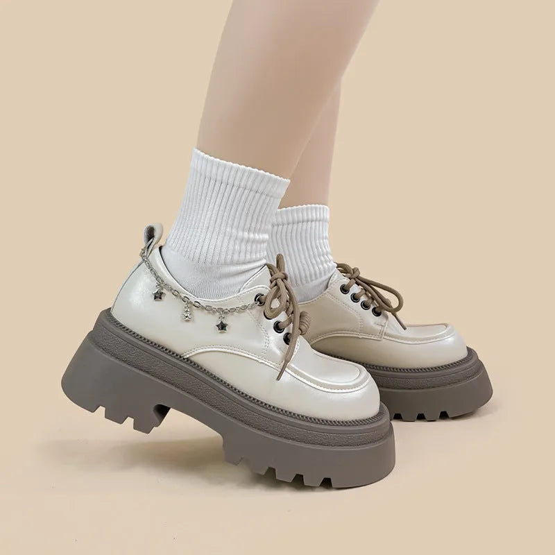 White women's platform leather shoes with chunky heel and lace-up front