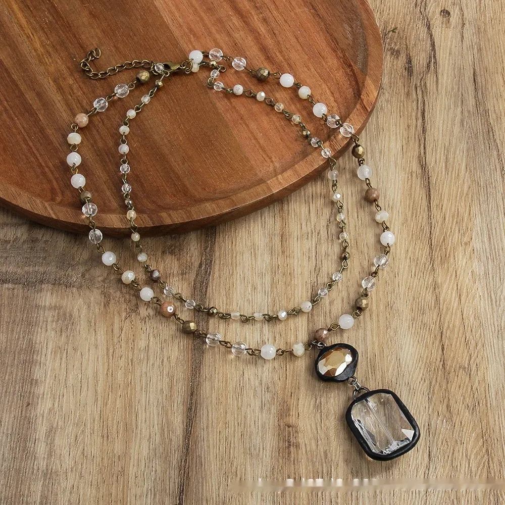 Tribal style two-layer chain necklace with natural stone and glass pendant