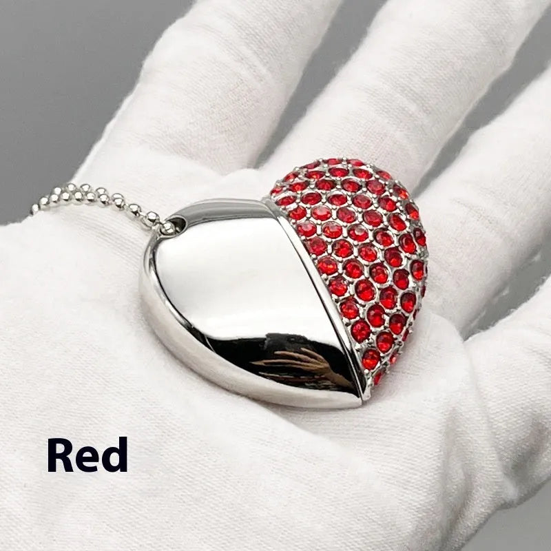 Blue heart-shaped metal USB flash drive with a brick pattern design on a white background.