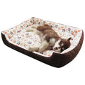 Soft plush dog bed with raised sofa edge in beige colour for small pets