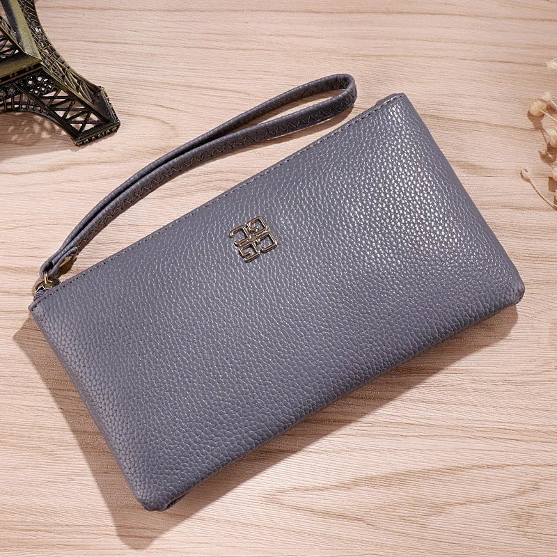 55-inch long PU leather phone wallet zipper handbag in solid colour with sewing line detailing