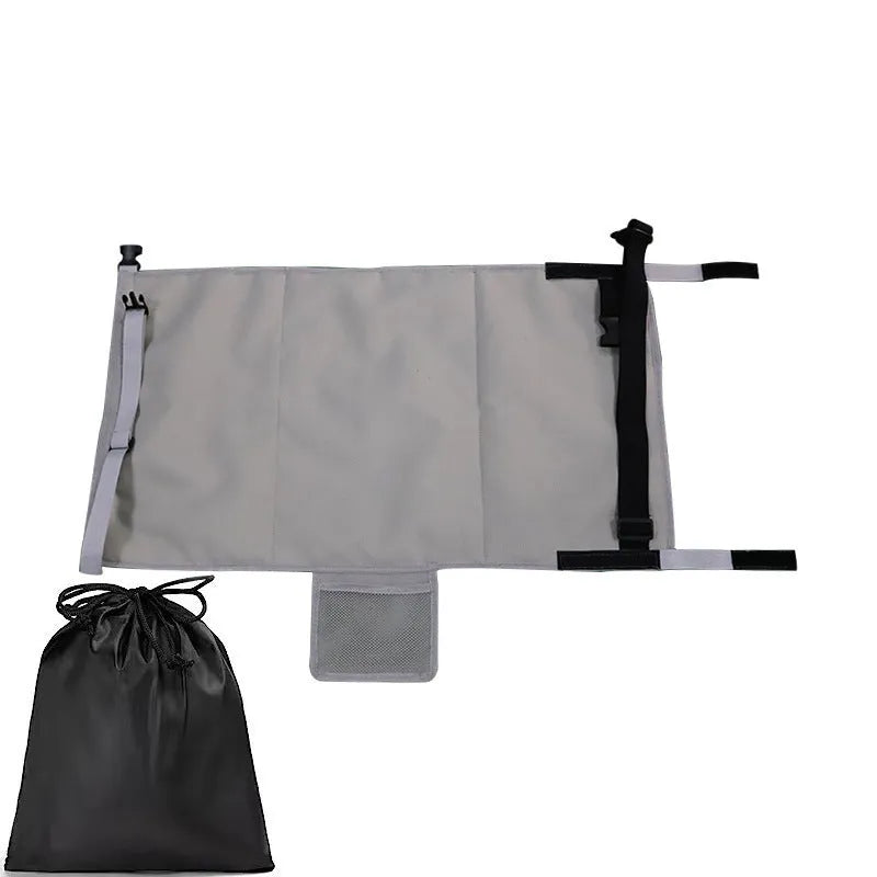Blue portable children's aircraft seat pedal extender with drawstring storage pocket for travel
